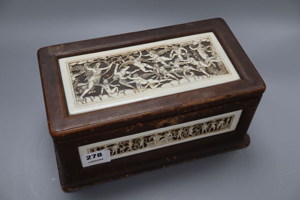 A neo-classical style ivory mounted leather casket, length 31cm